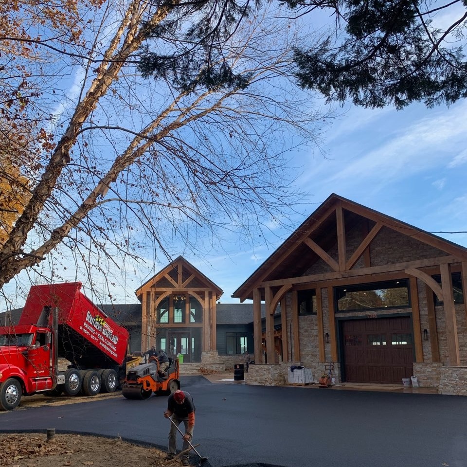 Drumptruck paving in front of beautiful home